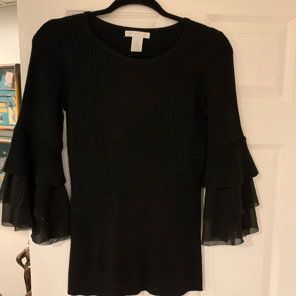 black shirt with long frilly sleeves